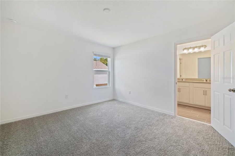 Spacious, unfurnished interior of a new home in Horse Creek at Crosswinds, Davenport (Image 13).