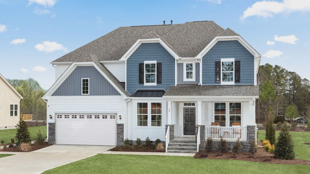 Representative exterior photo of a completed home built from the Stonefield by DRB Homes in Owen Park, Gibsonville, NC (Image 22).