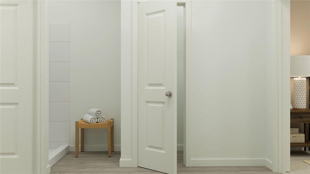 Hall featuring baseboards and light wood-type flooring
