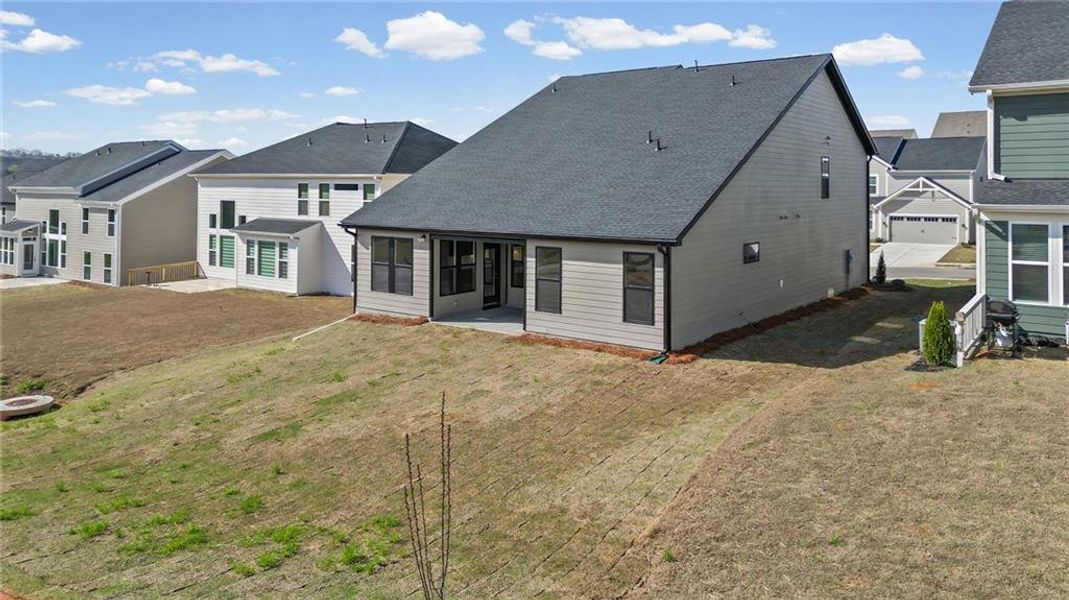 Exterior details and patio area of a home in Twin Lakes, Hoschton (Image 3).