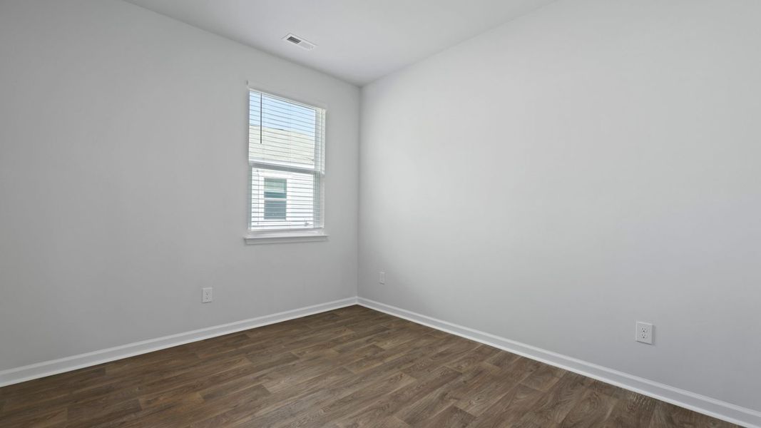 Representative unfurnished interior of a home built from the DOWNING by D.R. Horton in The Oaks at Center Station, Hollywood (Image 17).