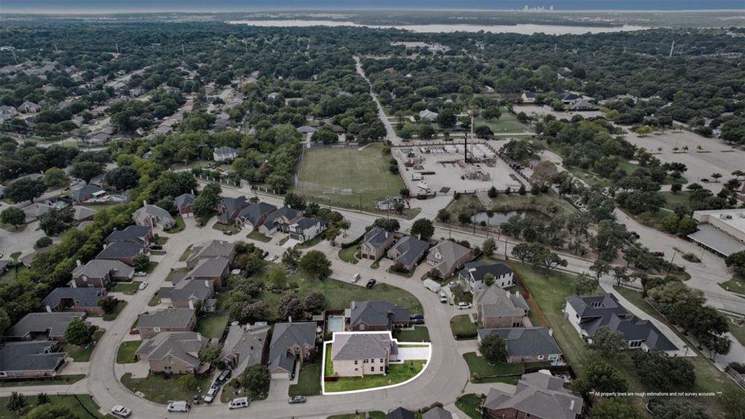 View of property location with a large body of water and nearby suburban area