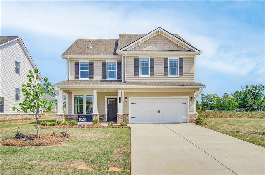 Front exterior of a new home in Cooper Park, McDonough, GA, highlighting curb appeal (Image 13).