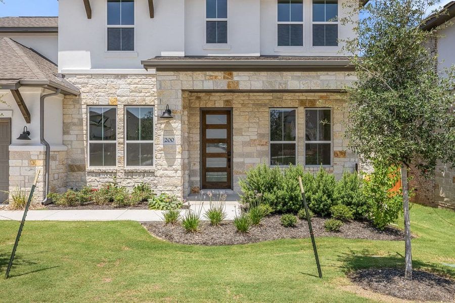 Exterior details and patio area of a home in Lariat, Liberty Hill (Image 3).