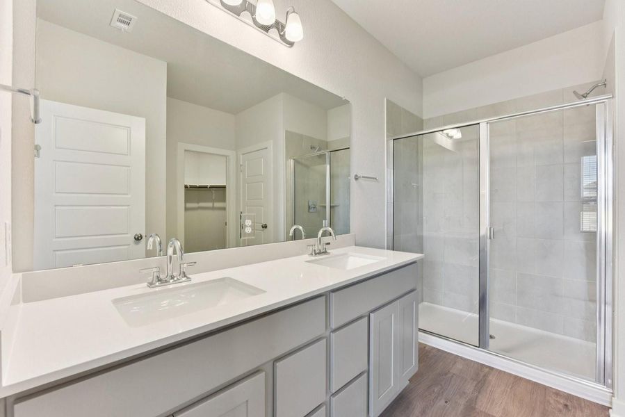 Furnished interior view inside a new home in Stallion Run, Buda (Image 12).