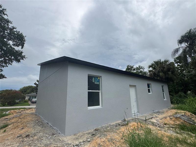 Front exterior of a new home in , Winter Garden, FL, highlighting curb appeal (Image 17).