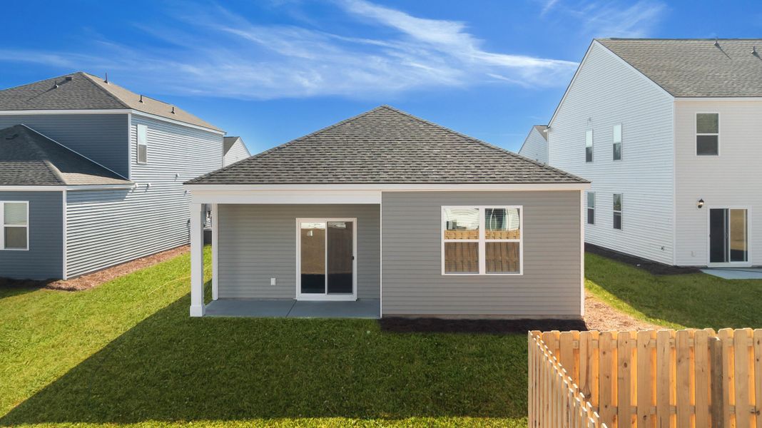 Exterior details and patio area of a home in Pine Hills at Cane Bay, Summerville (Image 3).