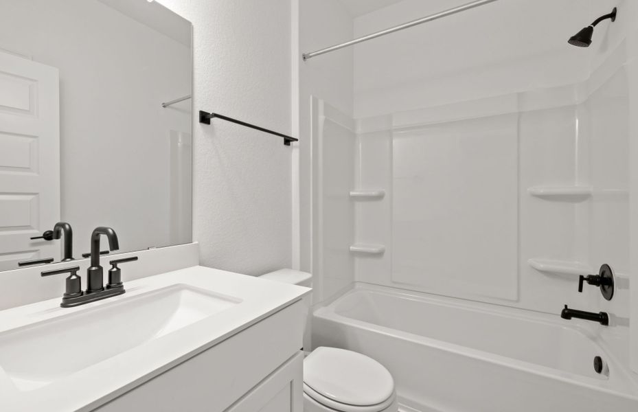 Representative furnished interior of a home built from the Burnet by Pulte Homes in Crosswinds, Kyle (Image 9).