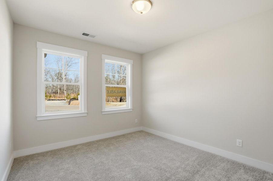 Spacious, unfurnished interior of a new home in Rone Creek, Waxhaw (Image 27).
