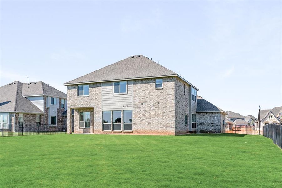 Front exterior of a new home in Abe's Landing, Granbury, TX, highlighting curb appeal (Image 26). Front exterior of a new home in Abe's Landing, Granbury, TX, highlighting curb appeal (Image 26).