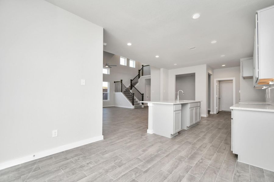 Sample photo of completed home with similar floor plan. Actual colors and selections may vary.