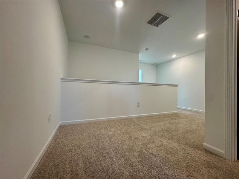 Spacious, unfurnished interior of a new home in Eastlyn Crossing, Flowery Branch (Image 30).