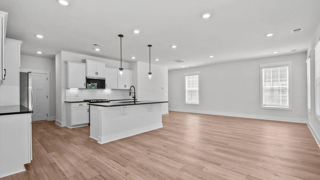 Representative furnished interior of a home built from the Jasmine by DRB Homes in Farms at Bellingham, Mooresville (Image 4). Representative furnished interior of a home built from the Jasmine by DRB Homes in Farms at Bellingham, Mooresville (Image 4).