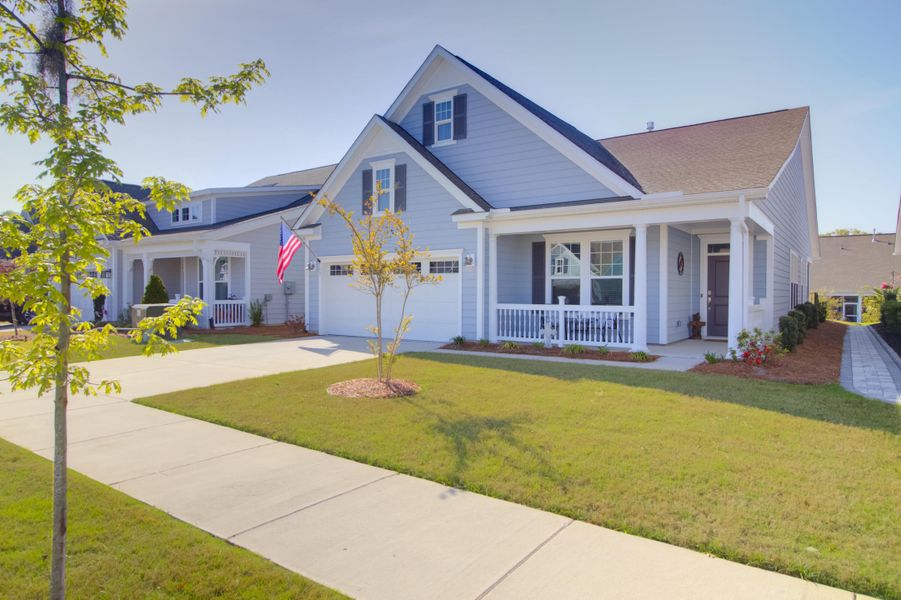 Front exterior of a new home in Cresswind Charleston, Summerville, SC, highlighting curb appeal (Image 23).