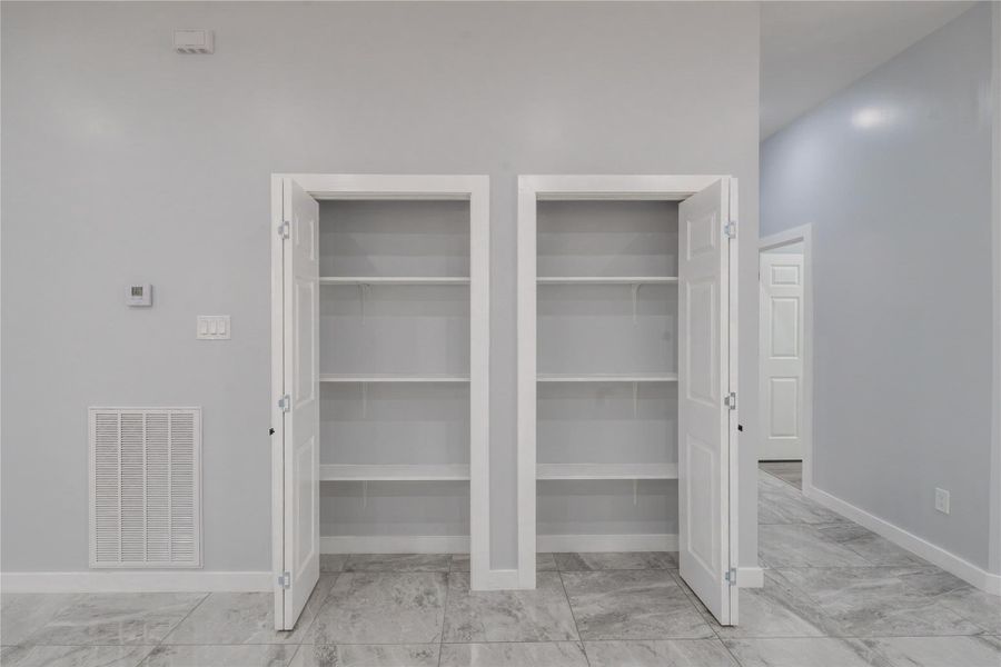 A great-sized wall pantry with plenty of room for all your snacks and treats.