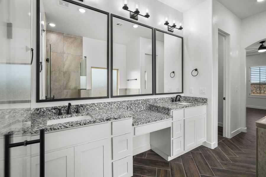 Representative furnished interior of a home built from the Scottsdale by LEH. Homes in Verdancia, El Paso (Image 36).