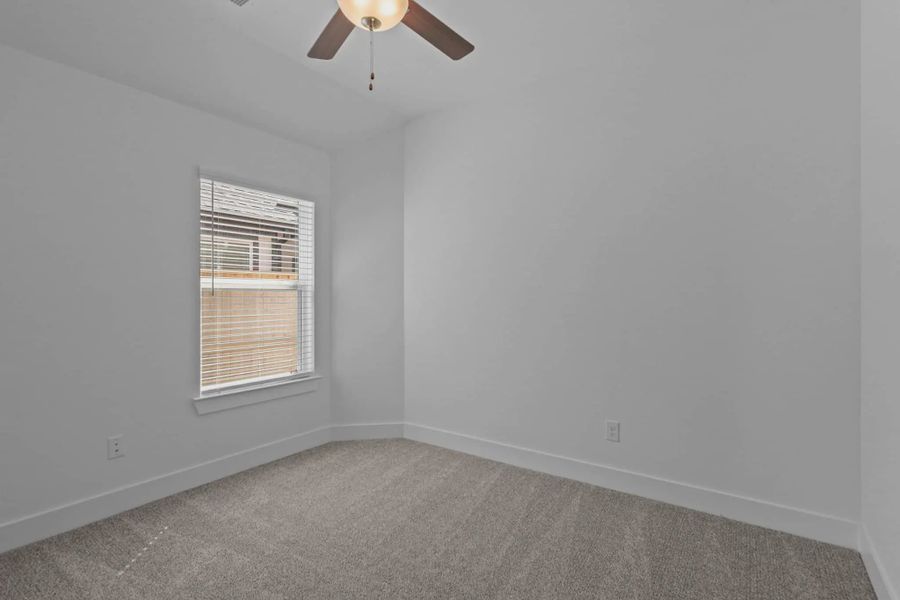 Representative unfurnished interior of a home built from the Carriagehouse by Chesmar Homes in Meridiana Townhomes, Iowa Colony (Image 72).