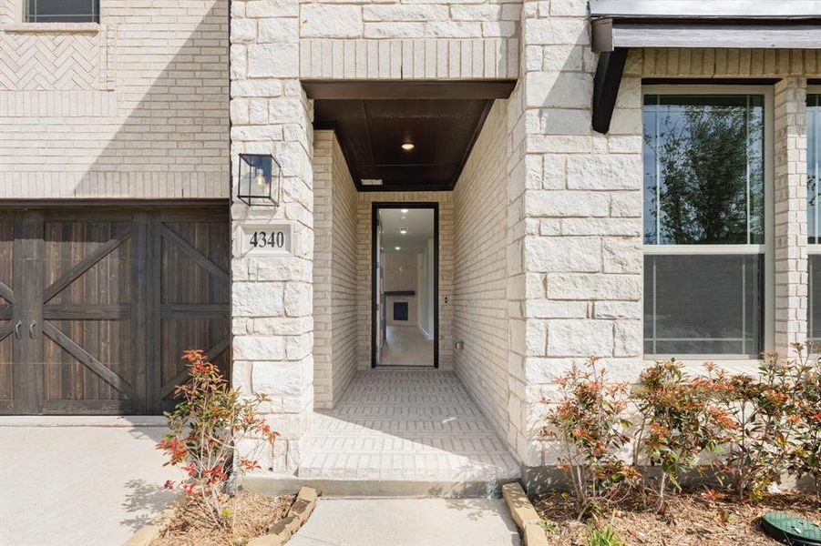 Exterior details and patio area of a home in Windsong Ranch, Prosper (Image 3).