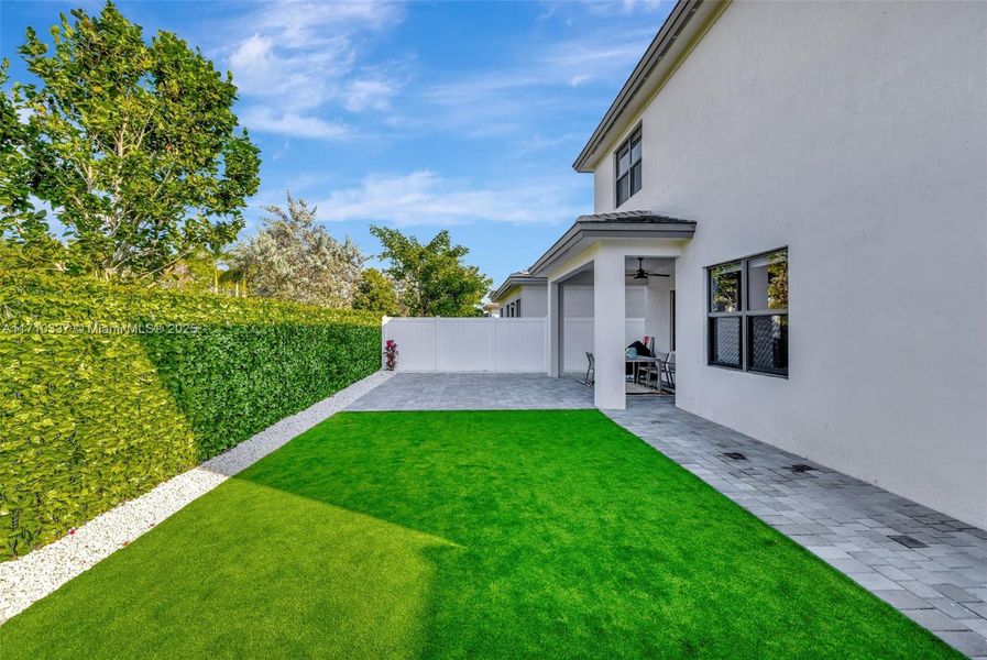 Expanded Paver patio / artificial turf backyard