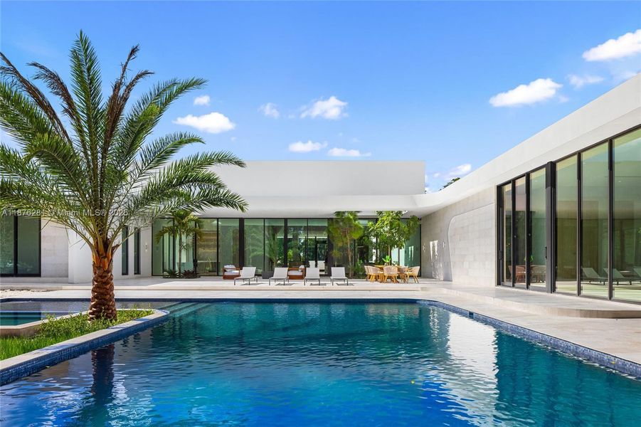 Front exterior of a new home in , Southwest Ranches, FL, highlighting curb appeal (Image 24).