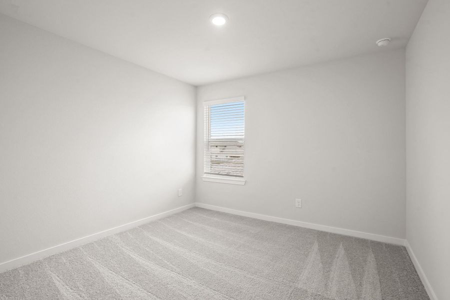 Spacious, unfurnished interior of a new home in Sunterra, Katy (Image 13).
