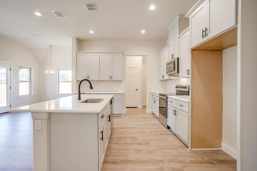 Representative furnished interior of a home built from the The Angelina by Trinity Classic Homes in Covenant Park, Springtown (Image 7). Representative furnished interior of a home built from the The Angelina by Trinity Classic Homes in Covenant Park, Springtown (Image 7).