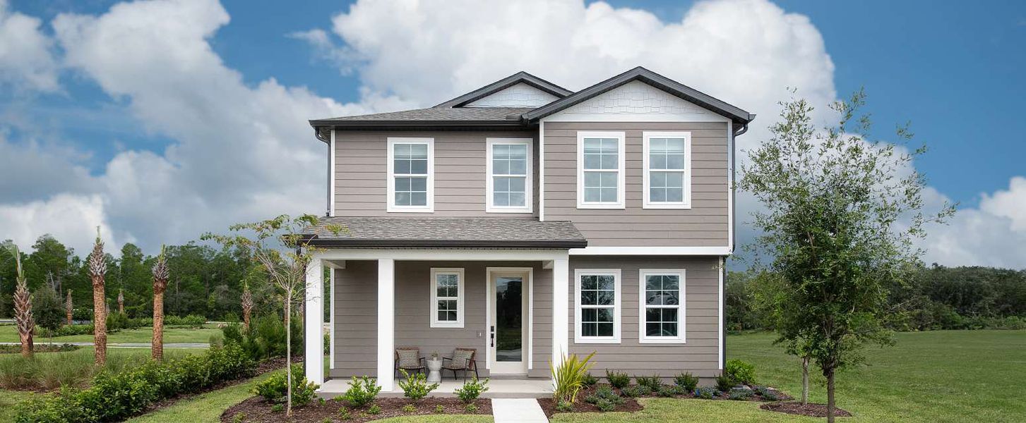 Representative exterior photo of a completed home built from the Taborfield by Ashton Woods in Ellington Classical, St. Cloud, FL (Image 1).