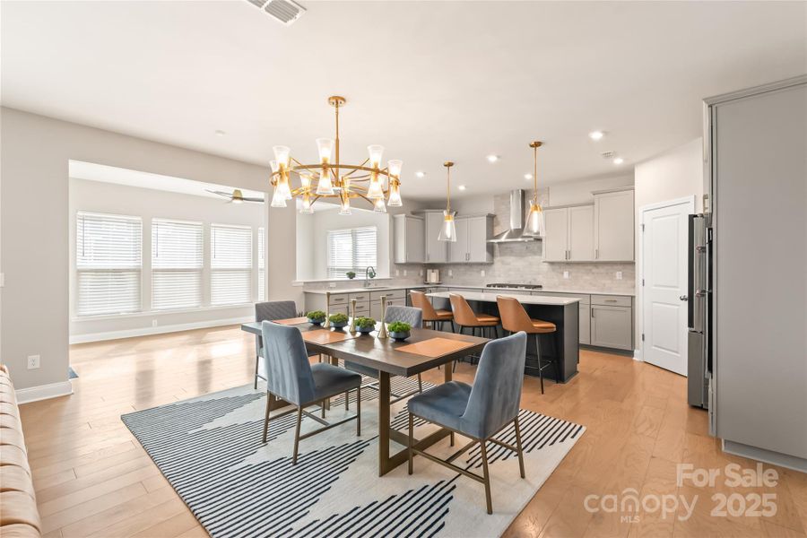 The open floor plan makes the heart of this home flow effortlessly. Perfect for entertaining or everyday living The open floor plan makes the heart of this home flow effortlessly. Perfect for entertaining or everyday living