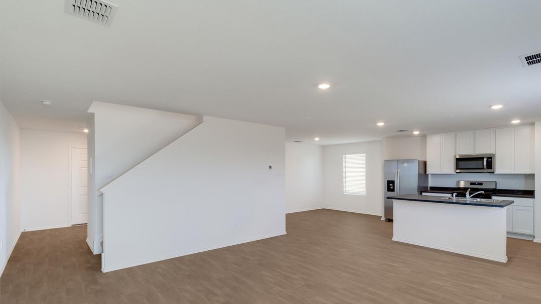 Spacious, unfurnished interior of a new home in Wayside, Uhland (Image 15). Spacious, unfurnished interior of a new home in Wayside, Uhland (Image 15).