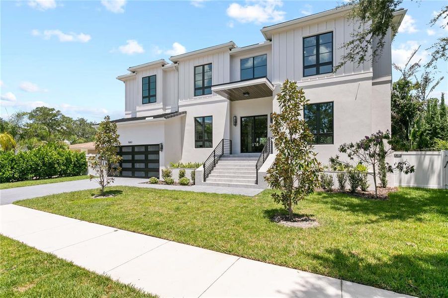 Front exterior of a new home in , Tampa, FL, highlighting curb appeal (Image 30). Front exterior of a new home in , Tampa, FL, highlighting curb appeal (Image 30).