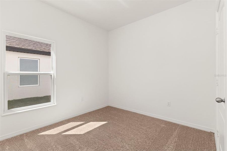 Spacious, unfurnished interior of a new home in Peach Crossings, Winter Haven (Image 17).