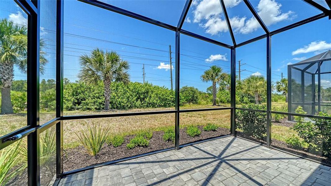 Exterior details and patio area of a home in Windward Real Estate and Homes for Sale in Sarasota, FL - Neal Communities, Lakewood Ranch (Image 22).