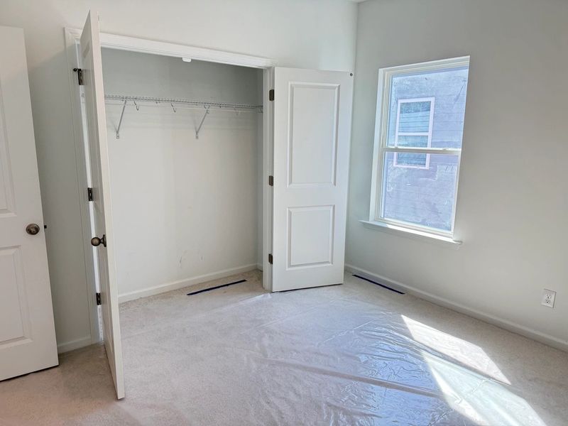 Spacious, unfurnished interior of a new home in Rowland's Grant, Fuquay Varina (Image 7).