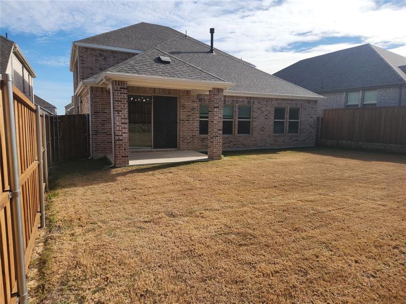 Exterior details and patio area of a home in Ashford Park - Texana Series, Corinth (Image 3).