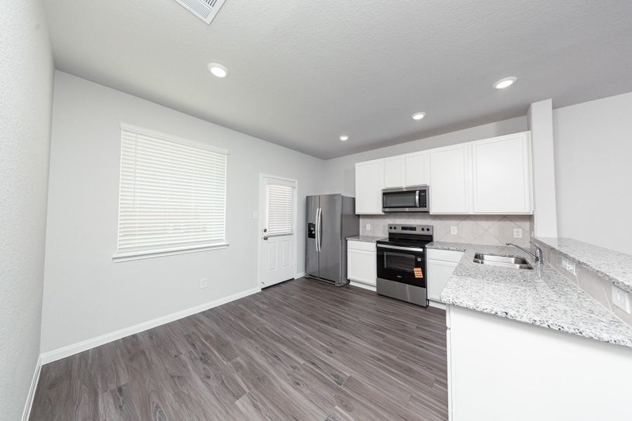 Furnished interior view inside a new home in Wayside Village, Houston (Image 8).
