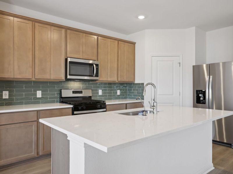 Furnished interior view inside a new home in Prairie Winds - Reserve Collection, Hutto (Image 5).