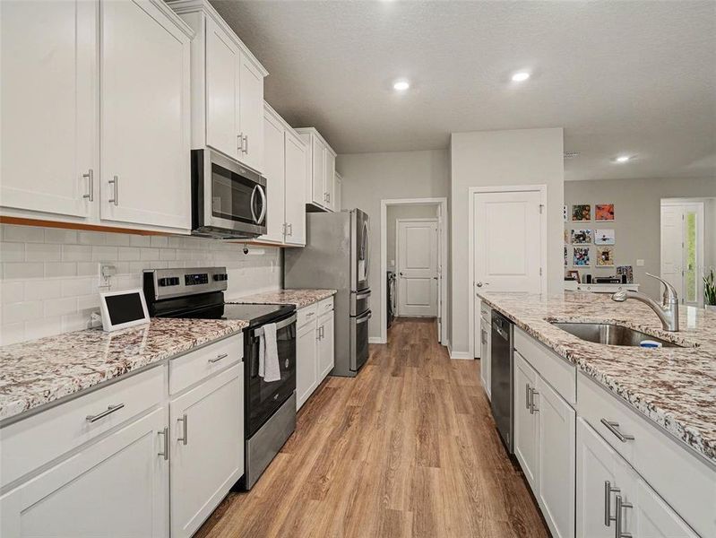 Furnished interior view inside a new home in Star Farms at Lakewood Ranch, Bradenton (Image 6).