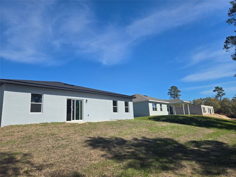 Exterior details and patio area of a home in , Ocala (Image 25).