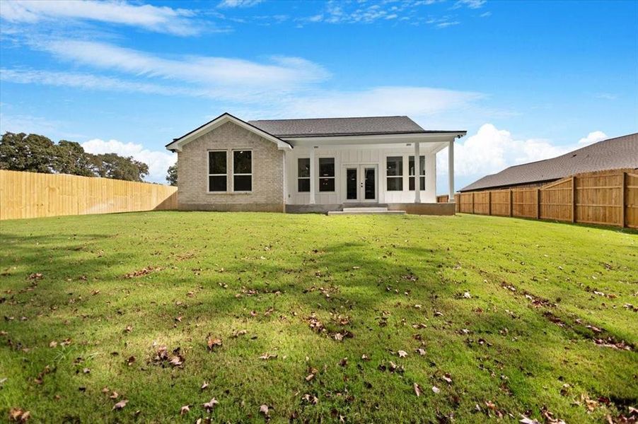 Front exterior of a new home in , Lindale, TX, highlighting curb appeal (Image 21).