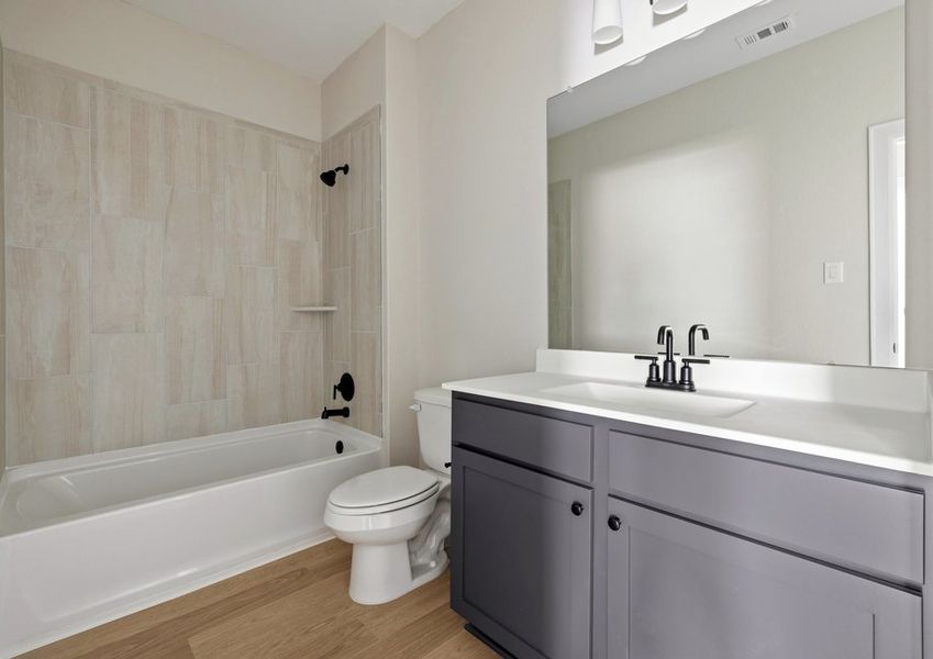 Secondary bathroom with a shower/tub combination Secondary bathroom with a shower/tub combination