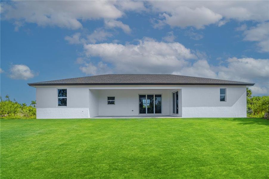 Exterior details and patio area of a home in , Port Charlotte (Image 11).