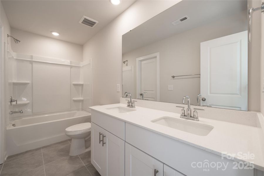 Photo is not of the actual home, but is an inspirational photo of builder’s model home and may depict options, furnishings, and/or decorator features that are not included Photo is not of the actual home, but is an inspirational photo of builder’s model home and may depict options, furnishings, and/or decorator features that are not included