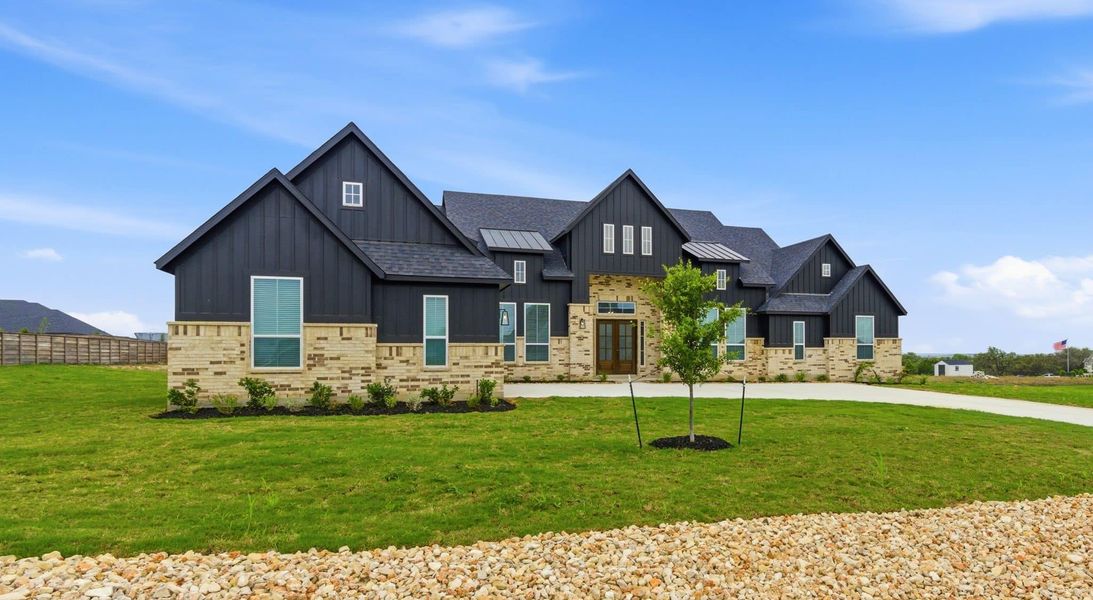 Front exterior of a new home in Regency Ranch, Marion, TX, highlighting curb appeal (Image 30).
