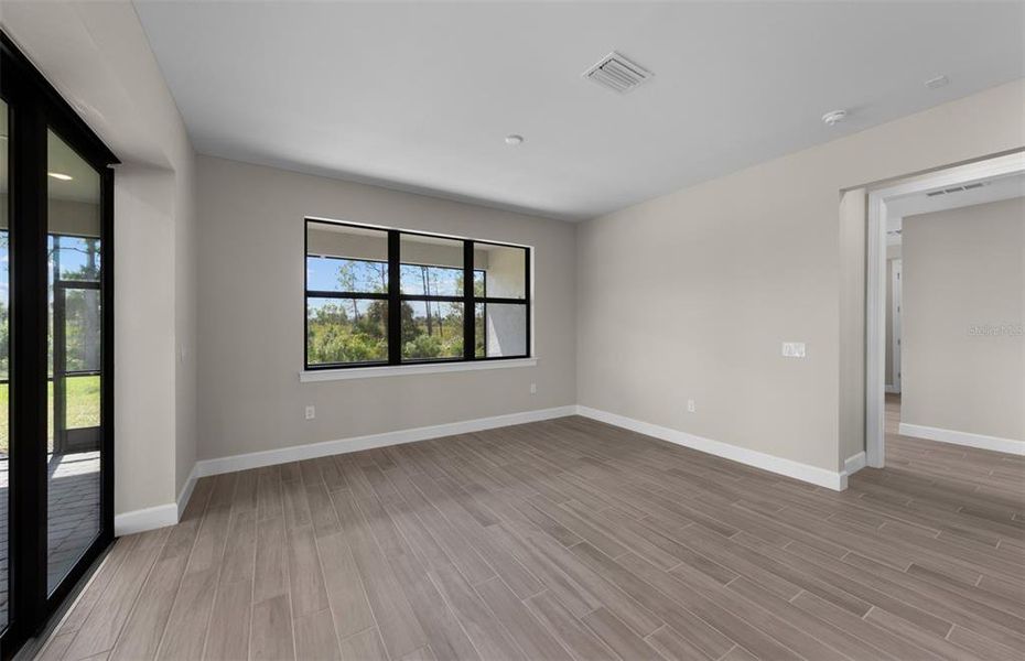 Spacious, unfurnished interior of a new home in Arbor Oaks, North Port (Image 17).