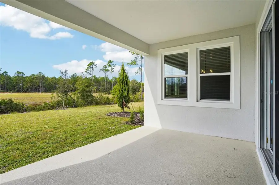 Exterior details and patio area of a home in , Ormond Beach (Image 3).