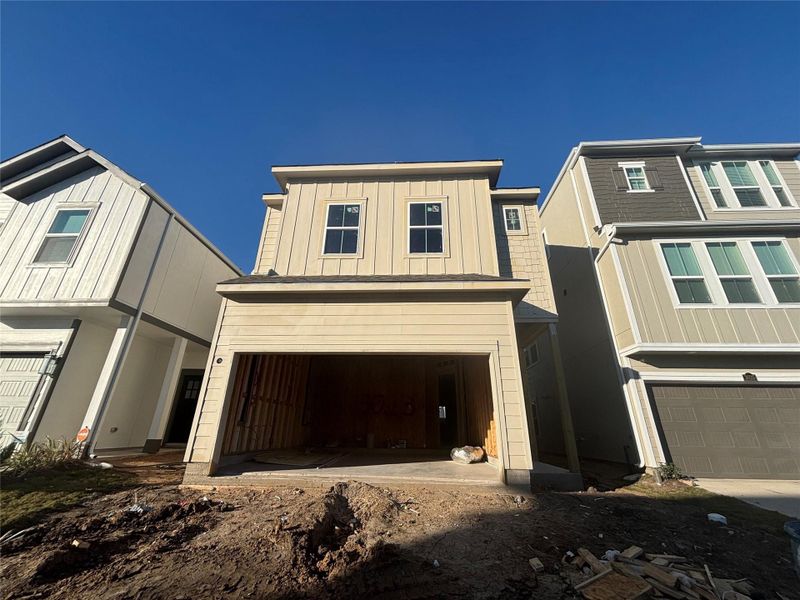 Three-story home with 3 bedrooms, 2.5 baths and 2 car garage
