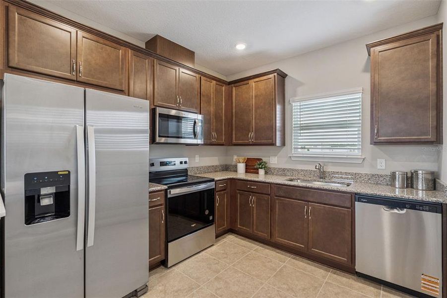 Furnished interior view inside a new home in Laureate Park, Orlando (Image 5).