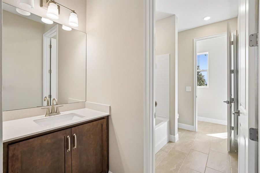 Sink and vanity for bedroom 2 featuring aspects of AW Collection® Roosevelt