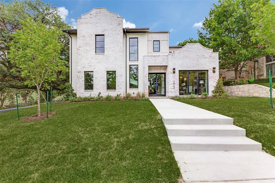 Front exterior of a new home in , Dallas, TX, highlighting curb appeal (Image 2). Front exterior of a new home in , Dallas, TX, highlighting curb appeal (Image 2).