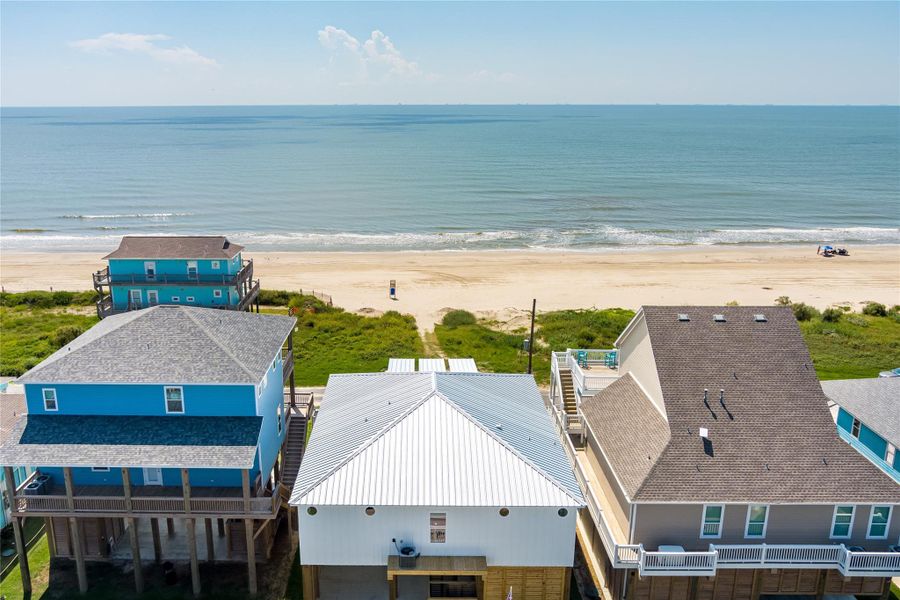 Front exterior of a new home in , Bolivar Peninsula, TX, highlighting curb appeal (Image 21).